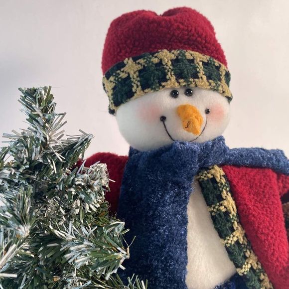 Plush Snowman holding artificial snow flocked tree. - Picture 9 of 9